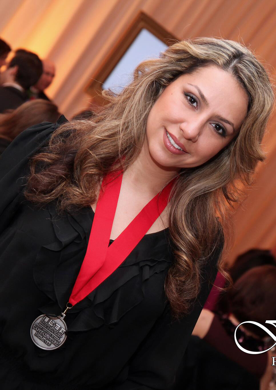 Woman in elegant black dress.