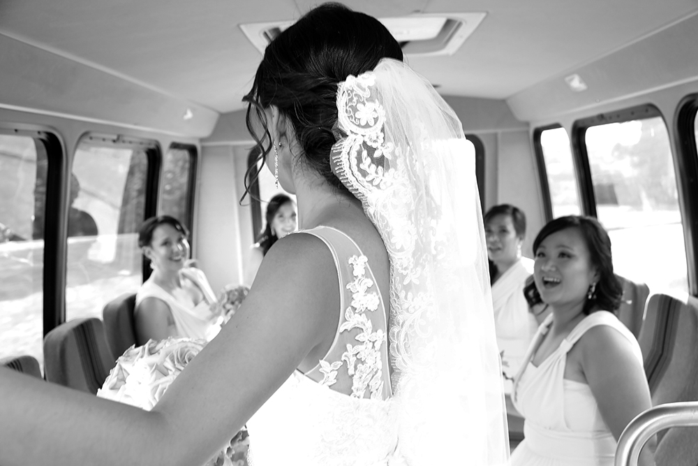 Bride preparing for wedding in bus.