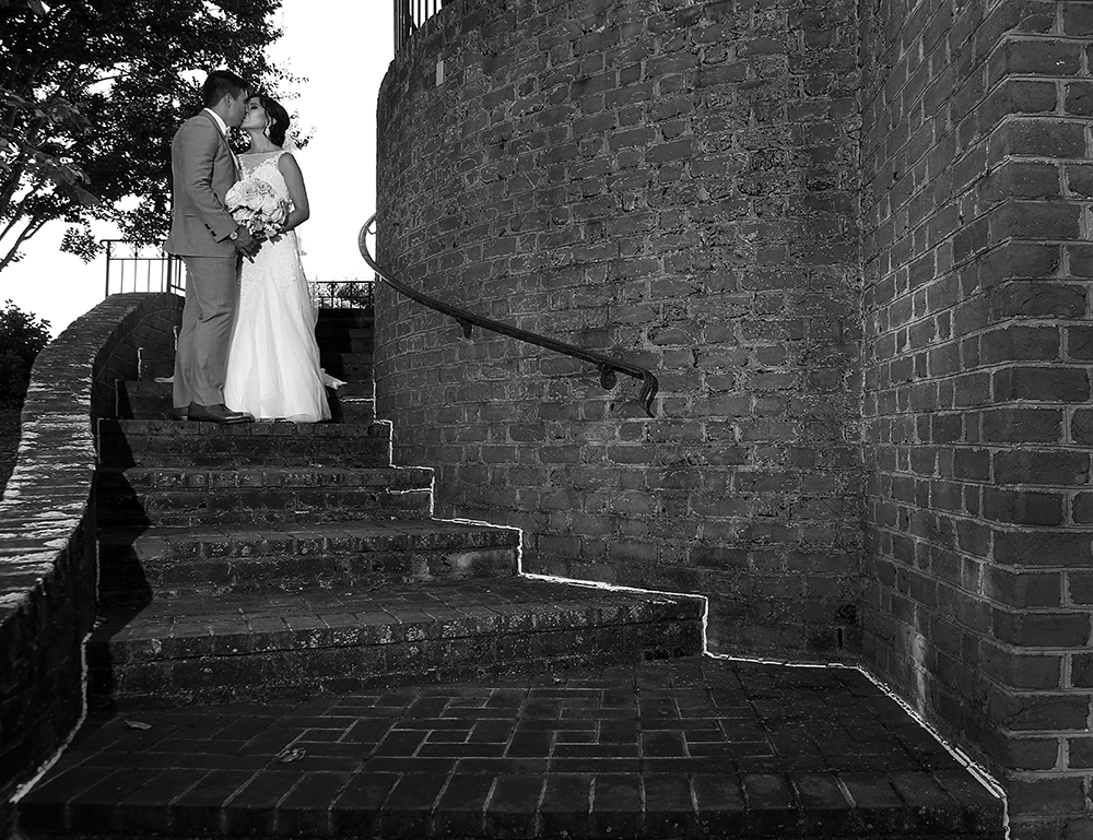 Wedding photo on brick steps.