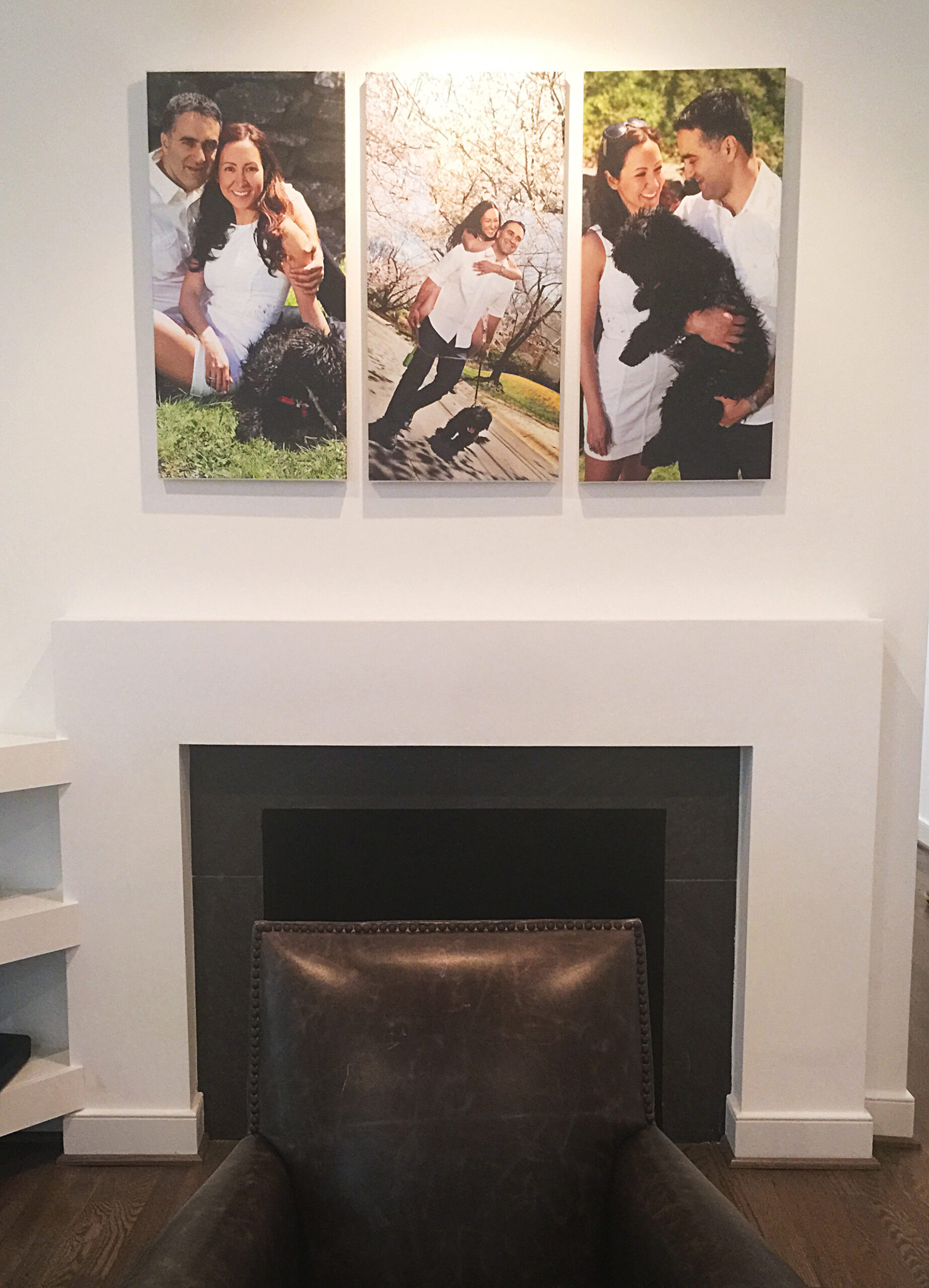 Couple in a boat on a calm lake, surrounded by nature's beauty.