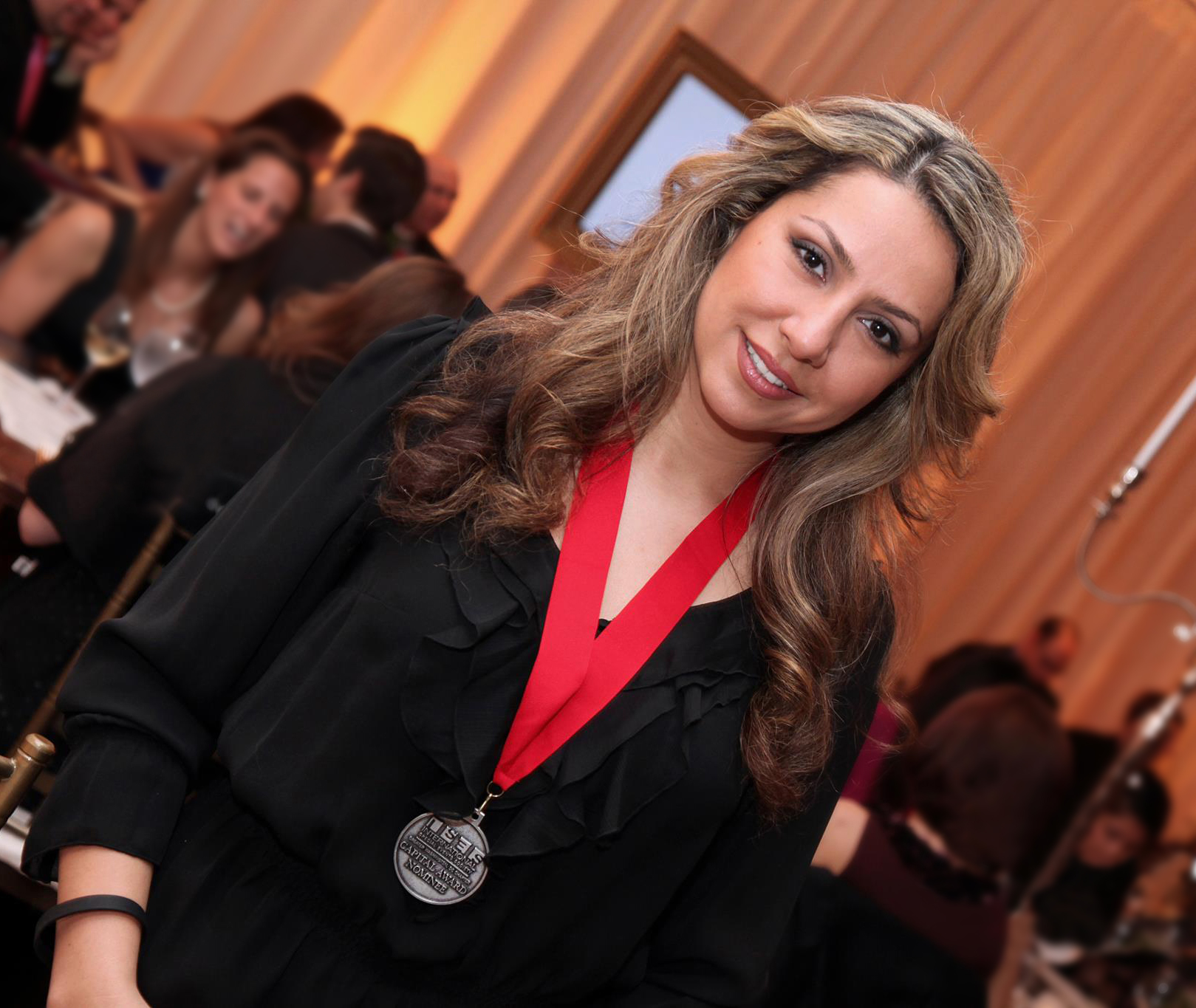 Woman in elegant black dress.
